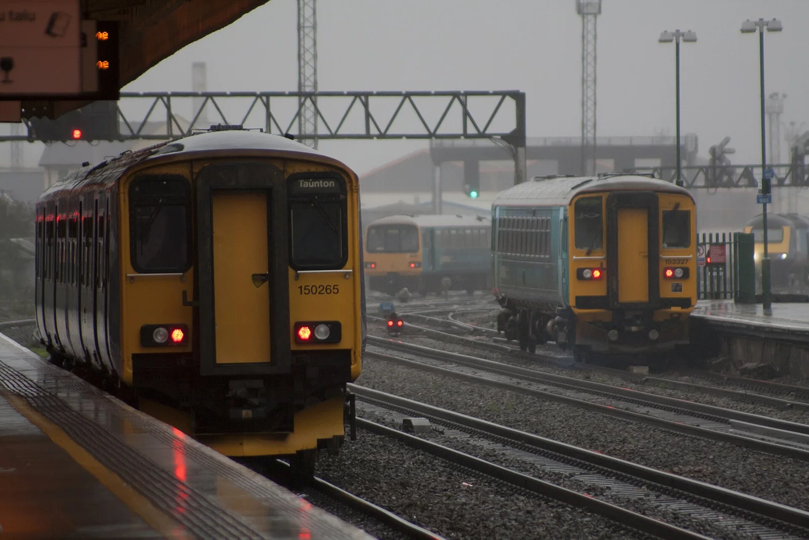 Trains in the rain (23342377251)
